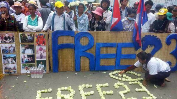 CAMBODIAN COURT CONVICTS, THEN RELEASES PROTESTORS