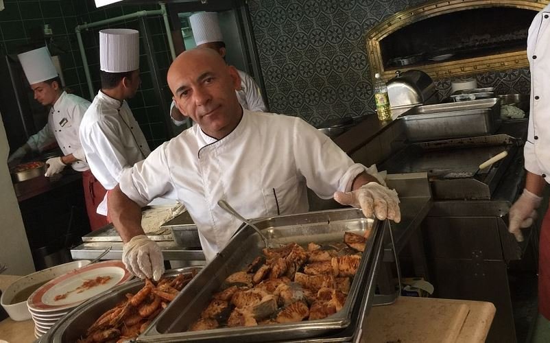 Chefs cooking inside emirates building