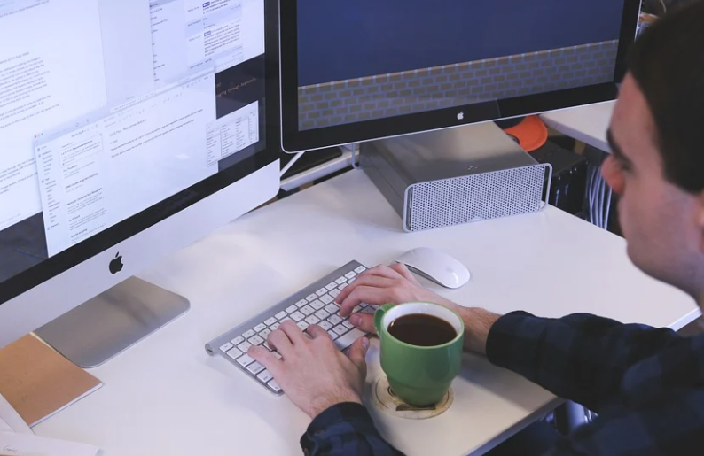 The Best Startup Helping Small Business Around the Globe startup business-man operating computer