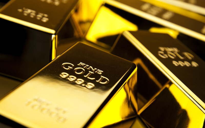Gold prices fall with Fed rate trajectory in focus.