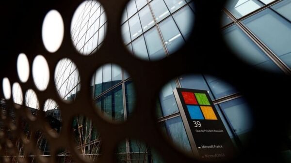 A view shows a Microsoft logo at Microsoft offices in Issy-les-Moulineaux near Paris, France, January 25, 2023. REUTERS/Gonzalo Fuentes/File Photo