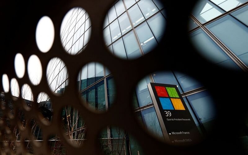 Microsoft, AFL-CIO reach deal on AI, labor neutrality A view shows a Microsoft logo at Microsoft offices in Issy-les-Moulineaux near Paris, France, January 25, 2023. REUTERS/Gonzalo Fuentes/File Photo