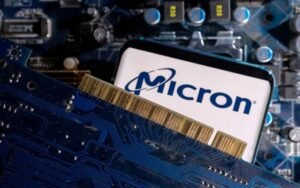 A smartphone with a displayed Micron logo is placed on a computer motherboard in this illustration taken March 6, 2023. REUTERS/Dado Ruvic/Illustration