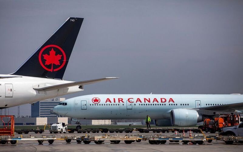 Air Canada’s adjusted loss narrows on strong travel demand
