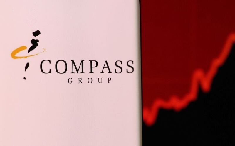 British caterer Compass sizzles on estimate rise and earnings leap