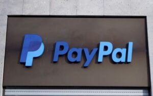 The PayPal logo is seen at an office building in Berlin, Germany, March 5, 2019. REUTERS/Fabrizio Bensch