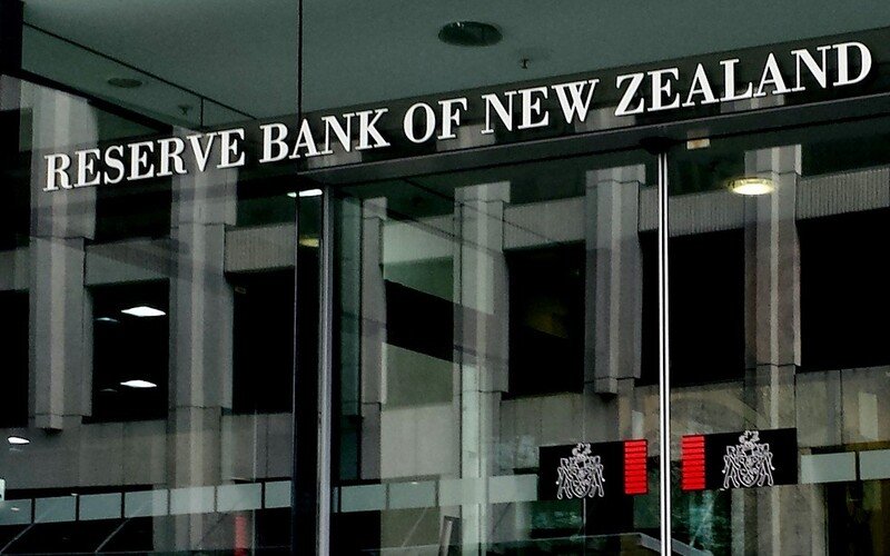 NZ central bank stops raising rates after 14-year peak.