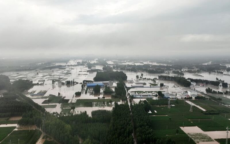 Rescuers focus on flooded city south of Beijing after historic rains in north China