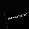 SpaceX logo and Elon Musk silhouette are seen in this illustration taken, December 19, 2022. REUTERS/Dado Ruvic/Illustration/File Photo