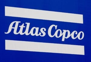 A Atlas Copco company logo is pictured at the "Bauma" Trade Fair for Construction, Building Material and Mining Machines and Construction Vehicles and Equipment in Munich, southern Germany, April 11, 2016. REUTERS/Michael Dalder/File Photo