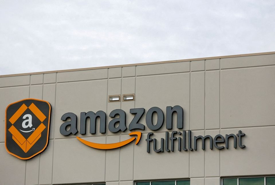 Amazon analysts expect same-day delivery to boost margins in Q3 A logo of the Amazon fulfillment is seen outside the Amazon fulfillment center in Kent, Washington, U.S., October 24, 2018. REUTERS/Lindsey Wasson/File Photo