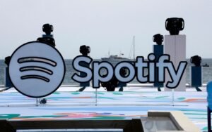A logo of Spotify is seen on a beach during the Cannes Lions International Festival of Creativity in Cannes, France, June 20, 2023. REUTERS/Eric Gaillard/File Photo
