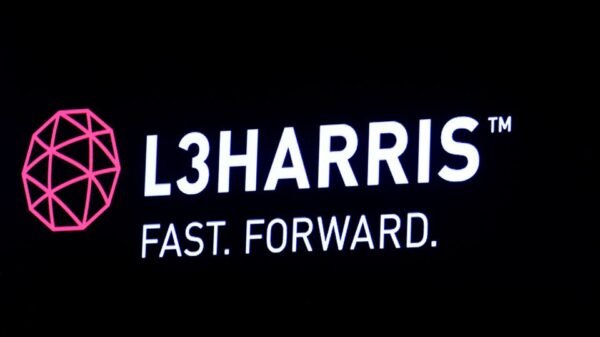 The logo of L3Harris is displayed on a screen on the floor of the New York Stock Exchange (NYSE) in New York, U.S., July 1, 2019. REUTERS/Brendan McDermid/File photo