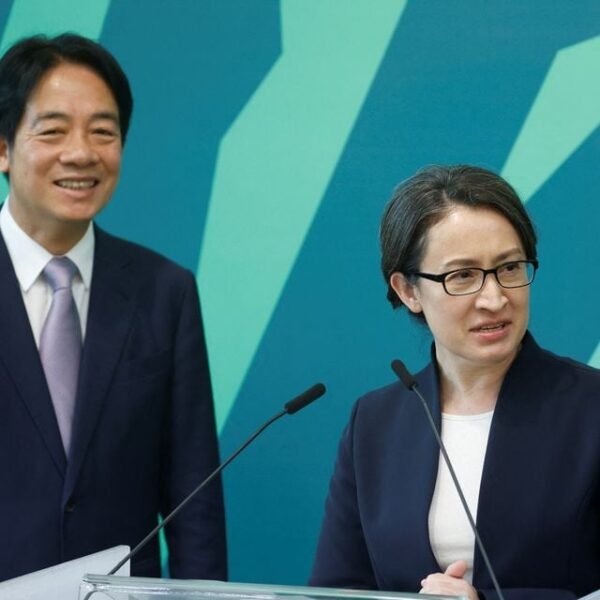 Hsiao Bi-khim, former envoy to the United States speaks next to Lai Ching-te, Taiwan's vice president and the ruling Democratic Progressive Party's (DPP) presidential candidate, during a news conference in Taipei, Taiwan November 20, 2023. REUTERS/Carlos Garcia Rawlins