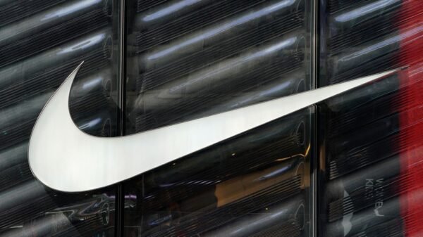 The Nike swoosh logo is seen outside the store on 5th Ave in New York, New York, U.S., March 19, 2019. REUTERS/Carlo Allegri/File Photo
