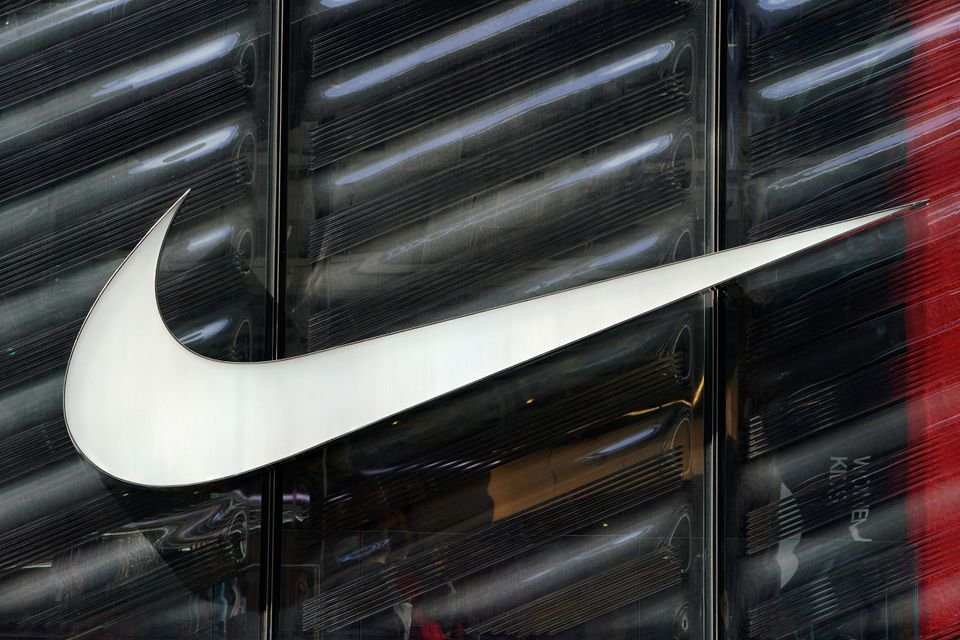 Nike sued New Balance and Skechers for patent infringement over sneaker technology The Nike swoosh logo is seen outside the store on 5th Ave in New York, New York, U.S., March 19, 2019. REUTERS/Carlo Allegri/File Photo
