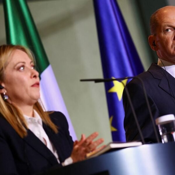 German Chancellor Olaf Scholz attends as Italian Prime Minister Giorgia Meloni speaks during a news conference at the Chancellery in Berlin, Germany, February 3, 2023. REUTERS/Christian Mang/File Photo