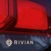 The Rivian name and logo are shown on one of their new electic SUV vehicles in California The Rivian name and logo are shown on one of their new electric SUV vehicles in San Diego, U.S., December 16, 2022. REUTERS/Mike Blake