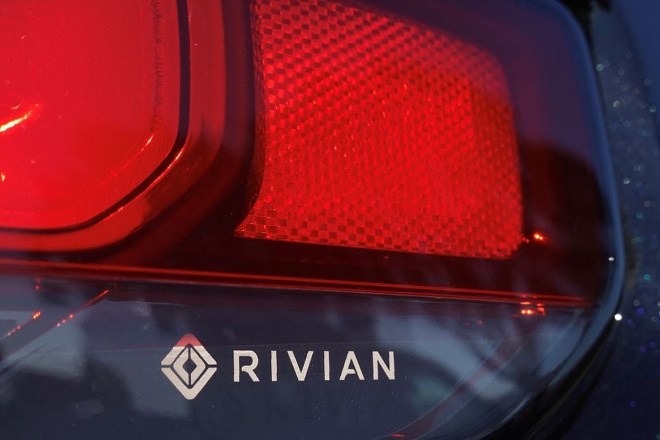 Rivian to raise nearly $15 bln in debt for EV plant in Georgia The Rivian name and logo are shown on one of their new electic SUV vehicles in California The Rivian name and logo are shown on one of their new electric SUV vehicles in San Diego, U.S., December 16, 2022. REUTERS/Mike Blake