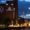 A slogan reading "VW thanks all Helpers" is displayed on a building at Volkswagen's headquarters to celebrate the plant's re-opening during the spread of the coronavirus disease (COVID-19) in Wolfsburg, Germany April 25, 2020. REUTERS/Fabian Bimmer/File Photo