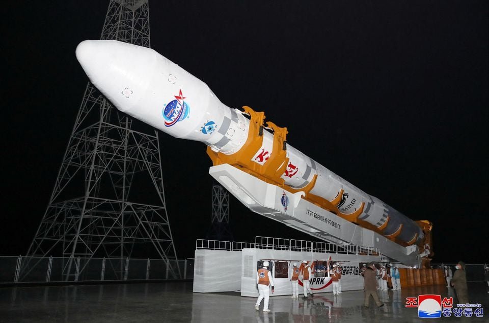 South Korea boosts military surveillance after North claims spy satellite launch A rocket carrying a spy satellite Malligyong-1 is prepared to be launched, as North Korean government claims, in a location given as North Gyeongsang Province, North Korea in this handout picture obtained by Reuters on November 21, 2023. KCNA via REUTERS