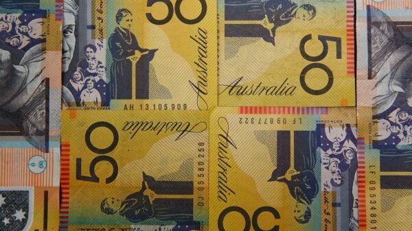 Australian dollars are seen in an illustration photo February 8, 2018. REUTERS/Daniel Munoz