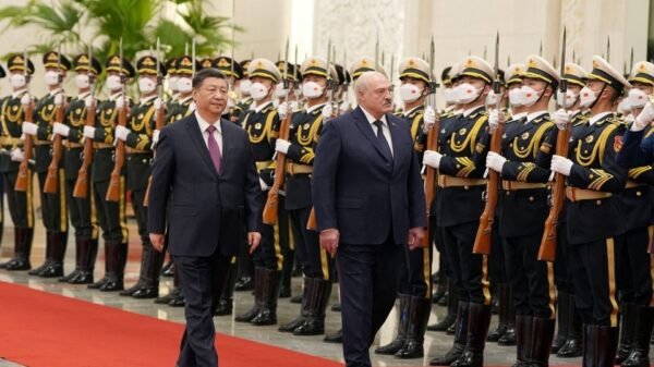 Chinese President Xi Jinping and Belarusian President Alexander Lukashenko review the honour guard during a welcome ceremony at the Great Hall of the People in Beijing, China March 1, 2023. cnsphoto via REUTERS/File photo