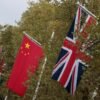 Chinese and British flags fly along the Mall in London, Britain October 19, 2015. REUTERS/Suzanne Plunkett/File Photo