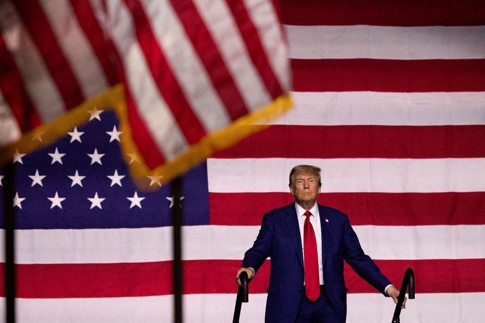 Trump barred from Colorado primary ballot for role in US Capitol attack Republican presidential candidate and former U.S. President Donald Trump attends a rally in Reno, Nevada, U.S. December 17, 2023. REUTERS/Carlos Barria/File Photo
