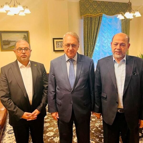 Senior Hamas officials Bassem Naim and Moussa Abu Marzouk, and Russia's Deputy Foreign Minister Mikhail Bogdanov meet for talks on the release of foreign hostages, at a location given as Moscow, Russia in this handout image released on October 26, 2023. Hamas Handout/Handout via REUTERS/File Photo