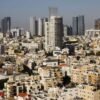 A general view of Tel Aviv's skyline is seen through a hotel window in Tel Aviv, Israel May 15, 2017. Picture taken May 15, 2017. REUTERS/Amir Cohen/File Photo
