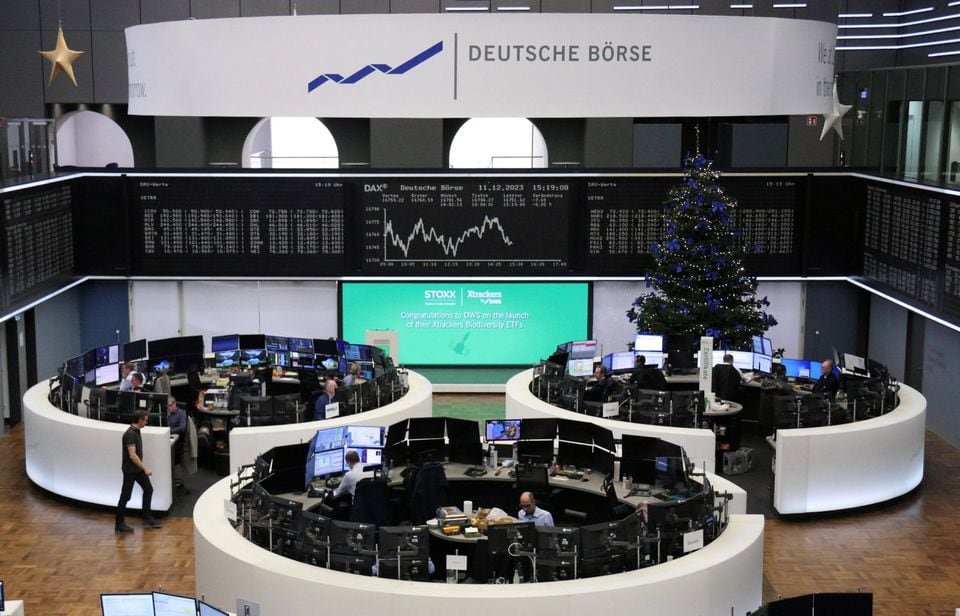 Stocks bide time ahead of Fed decision; oil slumps The German share price index DAX graph is pictured at the stock exchange in Frankfurt, Germany, November 11, 2023. REUTERS/Staff