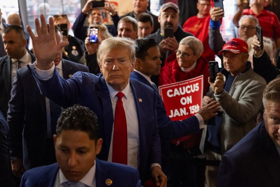 Trump: I won’t be a dictator if I become U.S. president again Former U.S. President and Republican presidential candidate Donald Trump rallies with supporters at a "commit to caucus" event at a Whiskey bar in Ankeny, Iowa, U.S. December 2, 2023. REUTERS/Carlos Barria/File photo