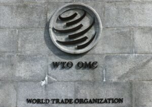 A logo is pictured outside the World Trade Organisation (WTO) in Geneva, Switzerland, September 28, 2021. REUTERS/Denis Balibouse/ File Photo