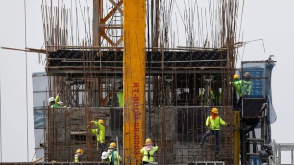 Workers construct a building in Bangkok, Thailand May 22, 2017. REUTERS/Jorge Silva/ File photo