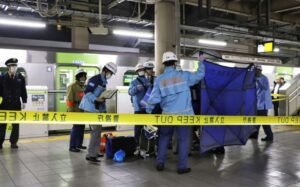 A person who believed to have been stabbed by a knife on the Yamanote loop train line is transported by ambulance members at JR Akihabara Station in Tokyo, Japan January 3, 2024, in this photo released by Kyodo. Mandatory credit Kyodo via REUTERS