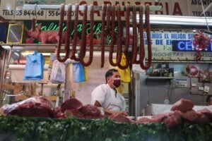 A butcher sells meat at a market in Mexico City, Mexico, January 19, 2022. REUTERS/Edgard Garrido/file photo