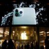 A screen displaying an advertisement for iPhone 11 Pro is seen outside an Apple store in Beijing, China October 31, 2019. REUTERS/Florence Lo/File Photo