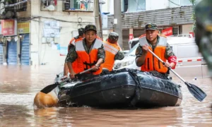 China Flood Crisis: Tens of Thousands Flee Rising Waters