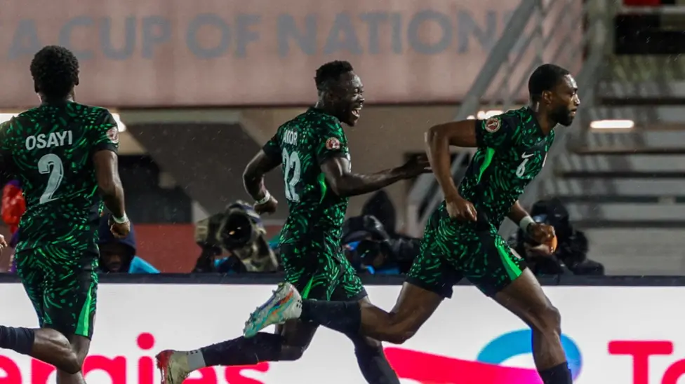 Nigeria began their bid for a fourth Africa Cup of Nations title with a gritty 2-1 victory over Tanzania in difficult, rain-soaked conditions in Fes.