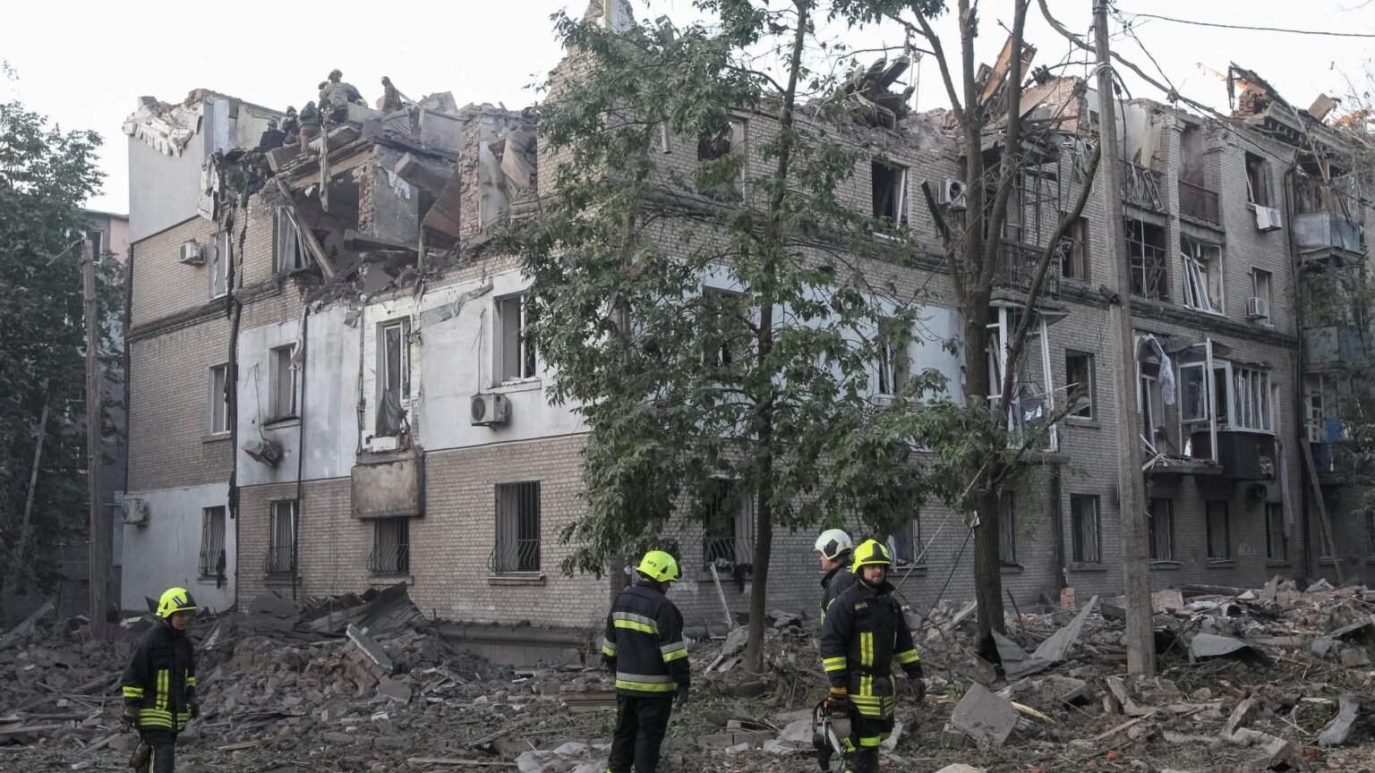 Ukraine rescuers pull dead from rubble after Russian strikes kill 21 people