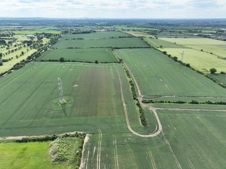An aerial view of green fields