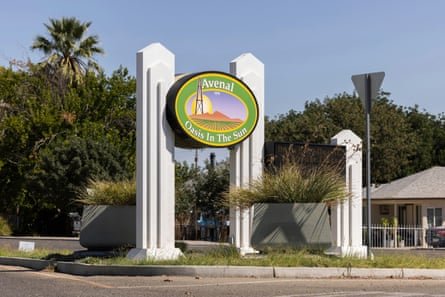 a sign reads ‘Avenal oasis in the sun’