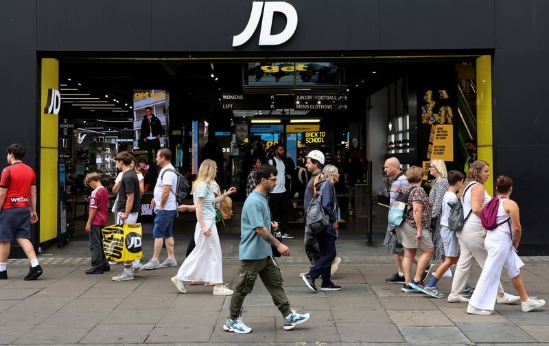 JD Sports cuts £50m from profit forecast as cost of living pressures hit trainer sales